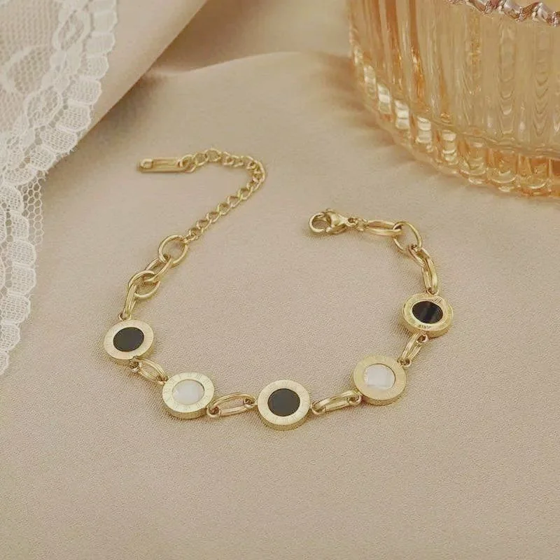 bracelet acier inoxydable plaqué or 18kdoré chiffres romains