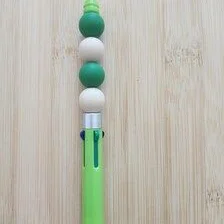 Stylo 4 couleurs avec jeton de caddie assorti en perles vertes fantaisie -" fleurs des Ours" - 