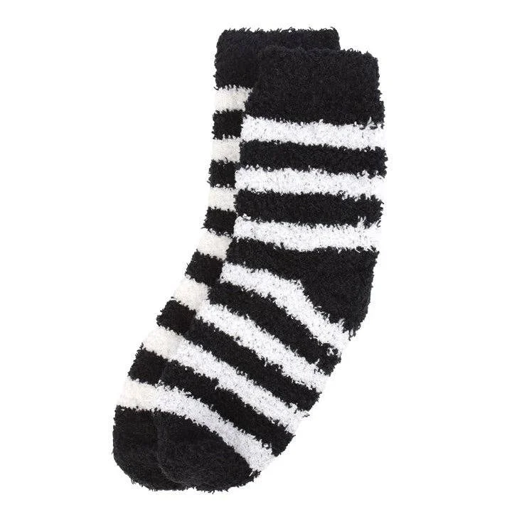 Chaussettes rayées dans un coffret cadeau en forme de cercueil