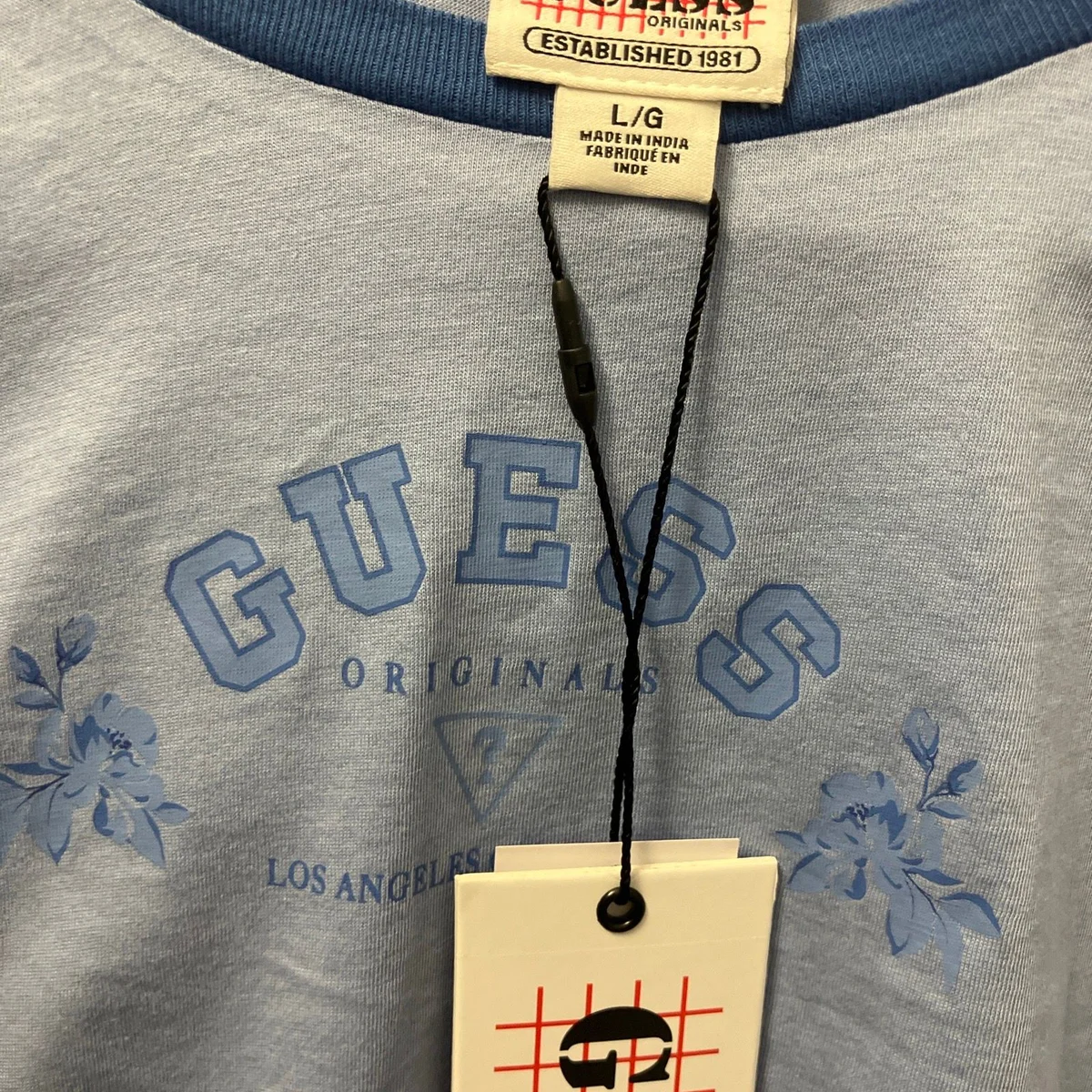-50% lot 3 hauts Guess T.M/L